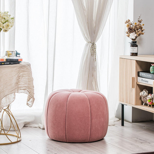 Pouf en velours rose avec rayures