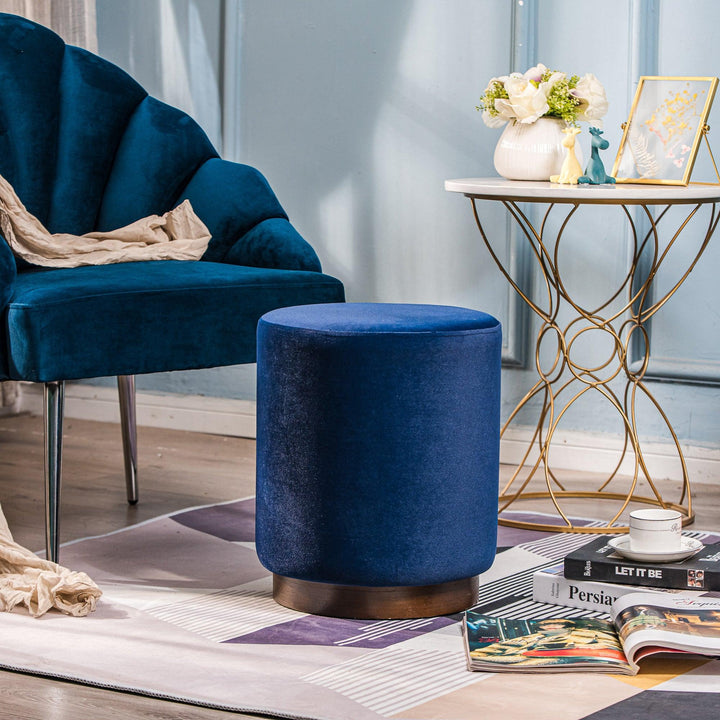 Pouf en velours bleu et base en bois