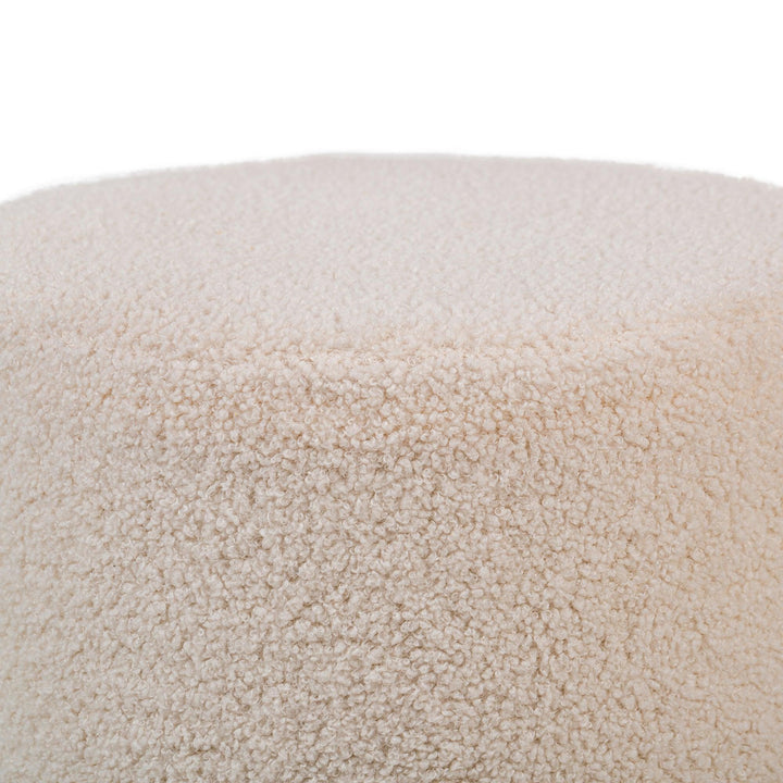 Pouf en bouclettes blanches et base en bois